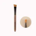 Angled eyebrow brush with natural animal hair and wooden handle, professional makeup tool. - Badger Hair