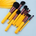 11-teiliges professionelles Make-up-Pinsel-Set mit gelben Griffen für Lidschatten und Puder - 11-teiliges Pinselset / Gelb