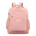 Sac à dos décontracté en nylon rose pour femme, sac de voyage léger avec multiples poches. - Rose