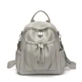 Sac à dos de mode pour femmes en cuir PU gris clair avec poche avant et bretelles chic. - Gris