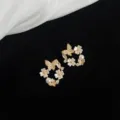 Detailansicht von Zirkon Perle Schmetterling Blume Ohrringen, elegante goldene Damenschmuck. - 2554 Schmetterlingskranz