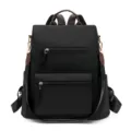 Sac à dos femme noir en nylon élégant avec détails en cuir marron et poches multiples. - Noir