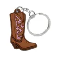 Llavero lindo de bota de vaquero marrón con detalles rosados, accesorio de bolso de PVC. - Bota de Vaquero Marrón