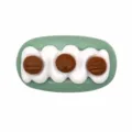 Close-up detail of the 3D PVC shoe charm, featuring cute cream and cookie design. - 323-08