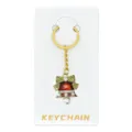 Kerstbel sleutelhanger met groene strik, glinsterende strass steentjes en parelhangers. - Kerstbel