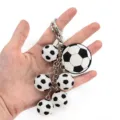 3D soccer keychain with multiple mini football pendants, cute metal lobster clasp ring accessory. - Classic Soccer Style