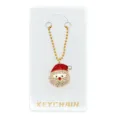 Detailopname van kerst kerstman strass sleutelhanger met gouden ketting en sprankelende kristallen. - Kerstman