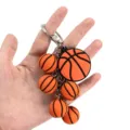 Basketball keychain with multiple miniature basketball pendants, metal ring and chain. - Basketball Pendant Style