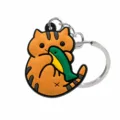 Schattige PVC zachtrubberen kat sleutelhanger, oranje kat met vis tas hanger voor je sleutels. - Kat die vis vasthoudt