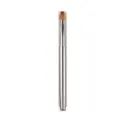 Retractable lip brush with metallic handle and brown bristles for precise makeup application. - White