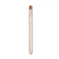 Retractable flat lip brush with metallic champagne handle and soft bristles for makeup. - Yellow