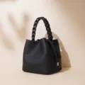 Bolso cubo de cuero negro con asa trenzada, bolso de mano elegante para trabajo. - Negro