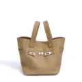 Classic genuine leather tote bag with metal lock closure and double handles for women. - Almond