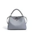 Grey genuine leather top-handle crossbody bag with twisted handle and metal turn lock closure. - Seagull Gray