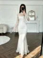 Precioso vestido largo de sirena en encaje blanco con manga larga y corte ajustado. - S / Blanco