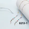 Minimalist gold tone glasses chain featuring colorful flower seed beads and anti-slip rings. - 8213-1