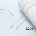 Elegant white pearl glasses chain with secure silicone loops for stylish eyewear retention. - 8206