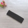 Zwarte sport hoofdband detail toont de zachte absorberende badstof katoen textuur. - Zwart