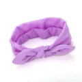 Purple fabric knotted hairband detail, soft textile rabbit ear headband accessory closeup. - Light Purple