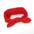 Red fabric knot headband rabbit ear hair accessory soft daily wear detail close-up view - Bright Red