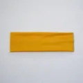 Solid yellow sports headband for yoga, elastic sweatband, wide hair hoop variant. - Yellow