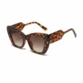 Trendy grote cat-eye zonnebril met schildpadmotief en stijlvolle gradiënt glazen. - Schildpad Montuur Dubbele Thee