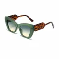 Occhiali da sole cat-eye con montatura verde trasparente, aste tartarugate e lenti sfumate. - Montatura Verde Trasparente Gamba Tartaruga Sopra Verde Sotto Giallo