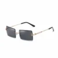 Lunettes de soleil rectangulaires sans monture avec branches dorées et verres gris. - CYU2100 verres entièrement gris