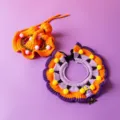 Close-up details of Halloween pet knitted collar, featuring cute pumpkin hat and festive charms. - 3D Little Ghost + Pumpkin Orange Hat