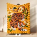 Cozy flannel throw blanket with artistic tiger and floral pattern, warm yellow home decor. - 5