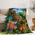 Detailed view of the cute dinosaur flannel blanket, soft plush fabric for cozy living room use. - 9