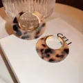Chic tortoise shell acrylic hoop earrings with gold tone metal hinge for women stylish daily wear. - Tortoiseshell Buckle