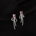 Exquisite pink crystal bow clip-on earrings, elegant sweet-cool style sparkling ear jewelry. - Rhinestone Knot Style