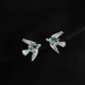 Exquisite silver-tone bird earrings featuring sparkling blue oval gemstone accents for women. - Rhinestone Bird Style