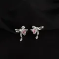 Silver tone bow clip-on earrings with cute pink heart zircon for non-pierced ears style - Zirconia Bow