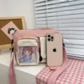 Rosa Segeltuch Umhängetasche für Damen, süße Itabag mit durchsichtiger Fronttasche und Gurt. - Rosa