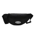 Bolso de pecho deportivo negro estilo urbano, nylon resistente, ideal para viajes y uso diario. - Negro