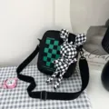 Black checkered canvas shoulder bag with cute rabbit charm, casual student crossbody bag. - Black