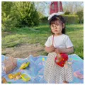 Kids cute ladybug crossbody bag children cartoon sequin shoulder bag mini coin purse detail view - Red