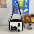 Stylish black and white crossbody bag, casual daily shoulder bag with cute front pocket. - Black