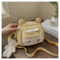 Cute yellow nylon cross body bag for women with bear ears, clear pocket and adorable teddy bear pendant. - Yellow