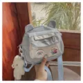 Cute nylon small crossbody bag for women, sweet Japanese style with bear ears and pendant. - Blue