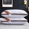 Luxury hotel pillow pair with quilted white fabric and brown piping for comfortable neck support. - Single-Sided Quilted Embroidered Pillow with Gusseted Edge (1 Piece) / 650g Low Pillow / White