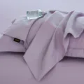 Ensemble de taies d'oreiller unies en pur coton, design violet minimaliste avec bordure soignée. - Paire de taies d'oreiller (50*80 cm) / Violet Clair