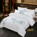 Detailed view of luxury white cotton bedding set with blue embroidery, 60s satin hotel style. - Blue and White Porcelain / 60s Cotton Sateen Hotel 4-Piece Set for 1.5m Bed