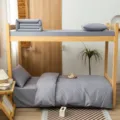 Parure de lit unie en coton pour lits superposés, variante de couleur grise, confortable. - Gris clair