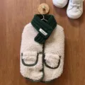 Detailed close-up view of the cozy fleece pet vest featuring a green knitted scarf. - Korean Style Cream White (Free Scarf)