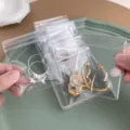 Sacchetti di stoccaggio trasparenti in PVC per gioielli con chiusura a zip per orecchini. - 6cm x 8cm / Trasparente