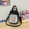 Black canvas crossbody ita bag with clear front pocket for student daily use and anime merch display - Black
