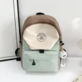 Colorblock casual backpack for students, stylish school bag with cute pendant and pockets. - Style Without Pendant / Green Small